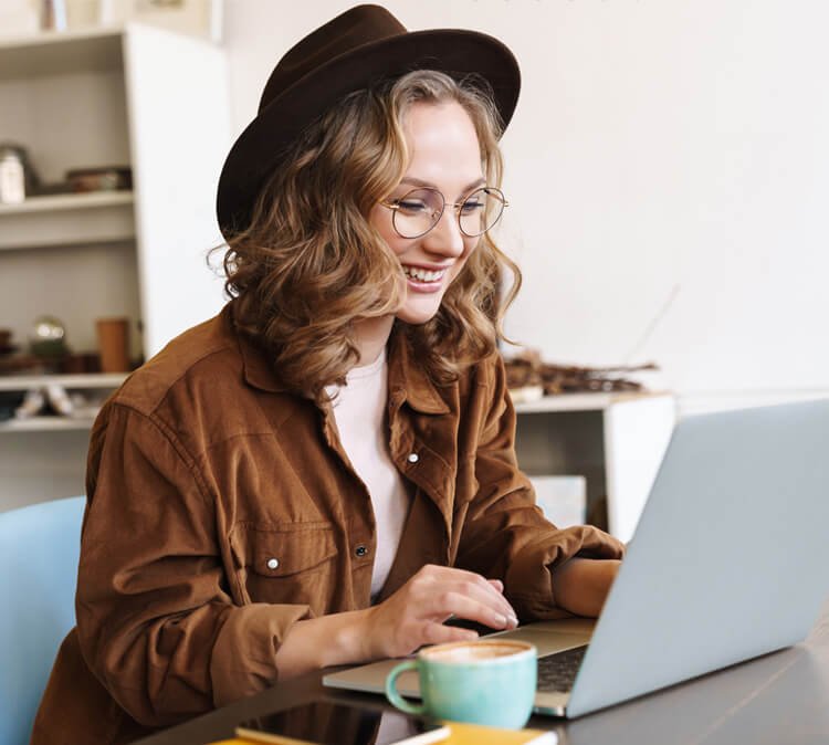 Woman studying an online course on her laptop